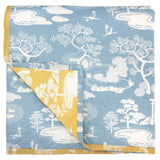 Blue side of the reversible Blue and Yellow Zen Onsen Garden Baby Quilt handprinted with a pretty Japanese inspired garden landscape.