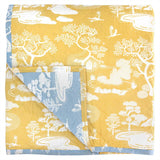 Yellow side of the reversible Blue and Yellow Zen Onsen Garden Baby Quilt handprinted with a pretty Japanese inspired garden landscape.