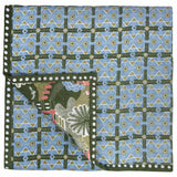 The reverse of the Lodhi Garden Baby Quilt which features a blue and green geometric check print Charbagh design