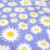 Detail of lily lotus baby quilt light purple floral lily flower pattern.