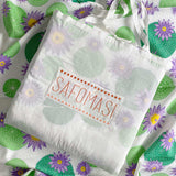 The Lily Lotus Baby quilt comes in a bag embroidered with the Safomasi logo for easy gifting.