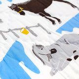 Close up of the Horse Ranch baby quilt handprinted with illustrations of horses.