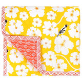 Yellow Weaver baby quilt handprinted with floral pattern of birds and flowers.