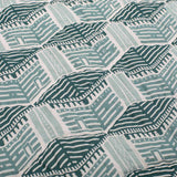 Detail of the handprinted hand quilted Blue Kullu house print on the reverse of the Mountain Zig Zag baby quilt.