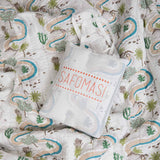 Winding Roads Baby Quilt in a cotton gift bag embroidered with the Safomasi logo, ideal for a newborn baby gift.